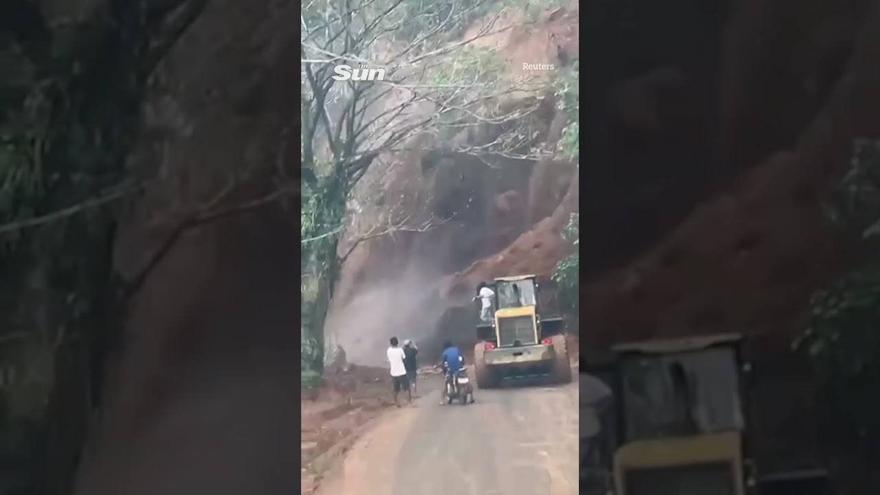Moment HUGE landslide crashes onto road in front of shocked drivers in the Philippines