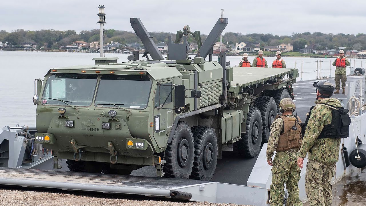U.S. Marines begin offloading lighterage equipment off USNS during MPFEX 20