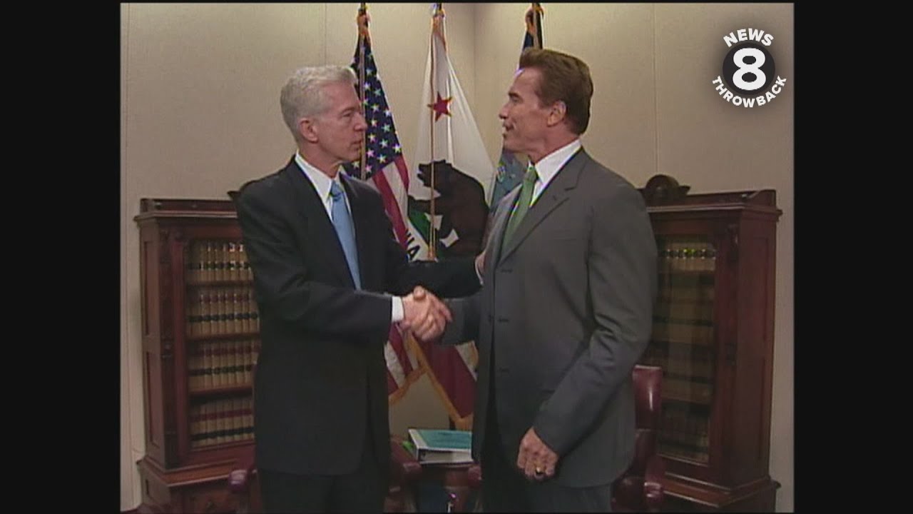 Governors Gray Davis and Arnold Schwarzenegger after recall election 2003