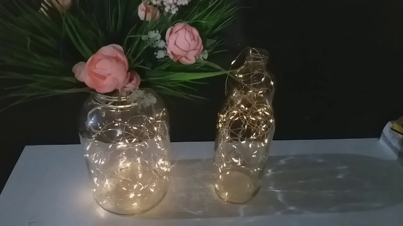 Arranjos com vidro de conserva e luz de led  ( do lixo ao luxo)