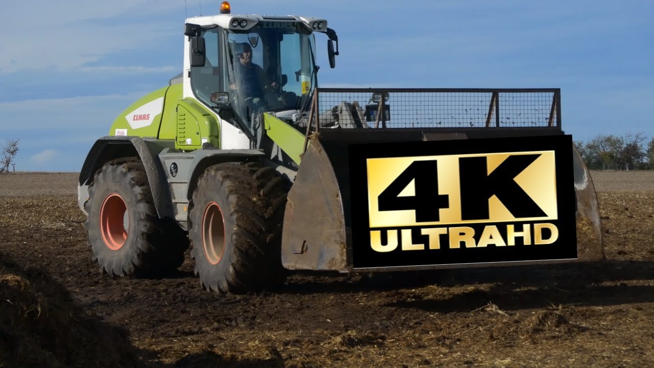 CLAAS Radlader: TORION VARIPOWER 1511   ..beim Mist laden!