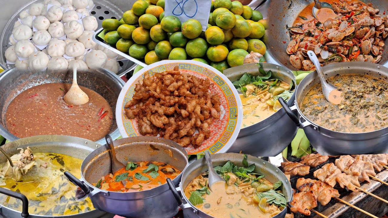 ตลาดพระประแดงตอนเย็นเต็มไปด้วยร้านค้าและผู้คน บรรยากาศอบอุ่นเป็นกันเองมีของอร่อยให้เลือกมากมาย