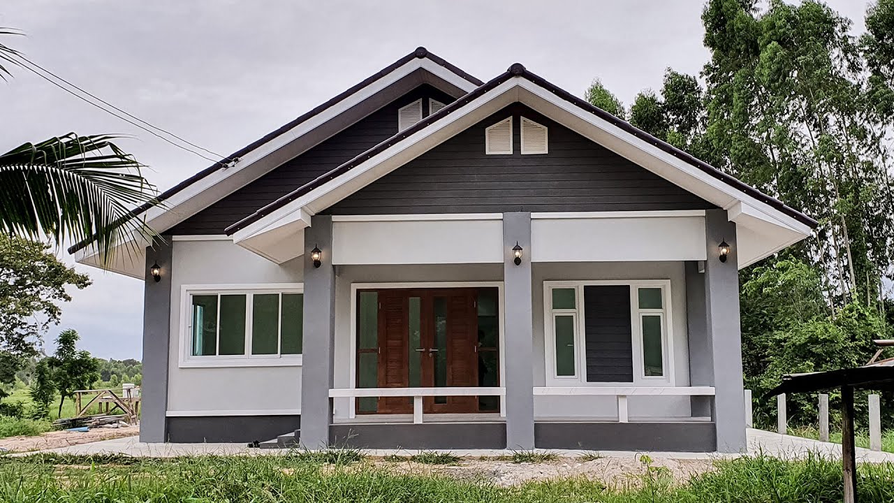 บ้านหลังคาทรงจั่วดีไซน์สวยงามเรียบง่าย ผนังภายนอกโทนสีเทา ฟังก์ชั่นภายในครบครัน 3 ห้องนอน 1 ห้องน้ำ