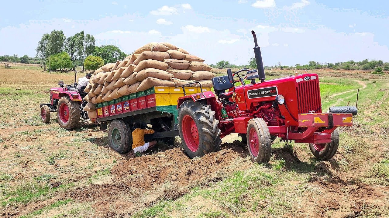 Mahindra 575DI xp plus tractor stuck in mud with full loaded trolley Rescued by another Mahindra