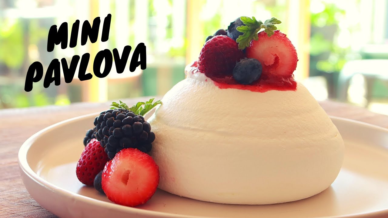 Mini pavlova with strawberry rhubarb compote & berries