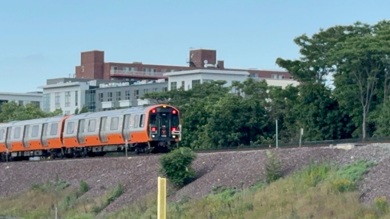 MBTA Orange Line Train in Malden center and old and new Red Line trains action Tribute