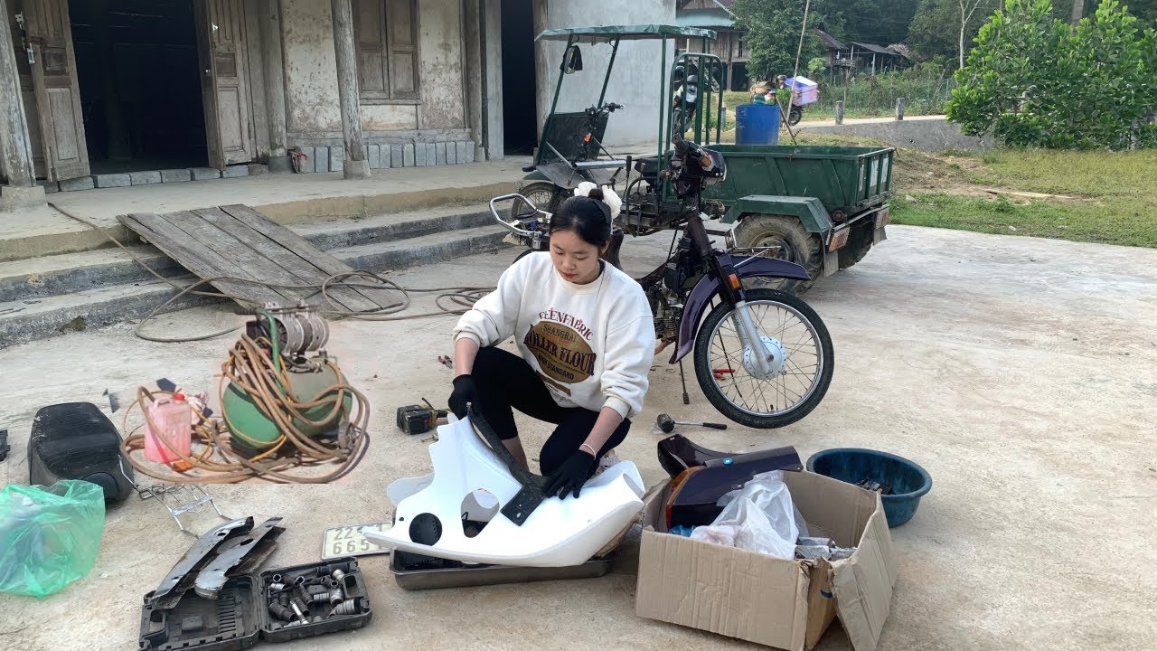 The girl brought tools to repair motorbikes for people on the spot.