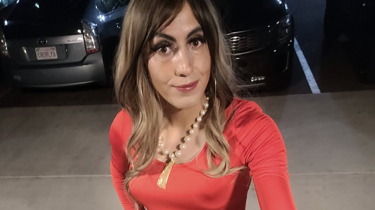 crossdresser walking around hotel in heels