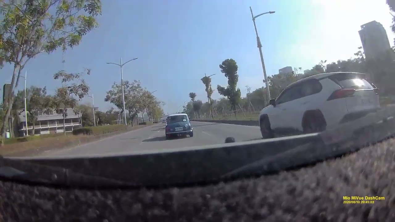 Austin mini passing by