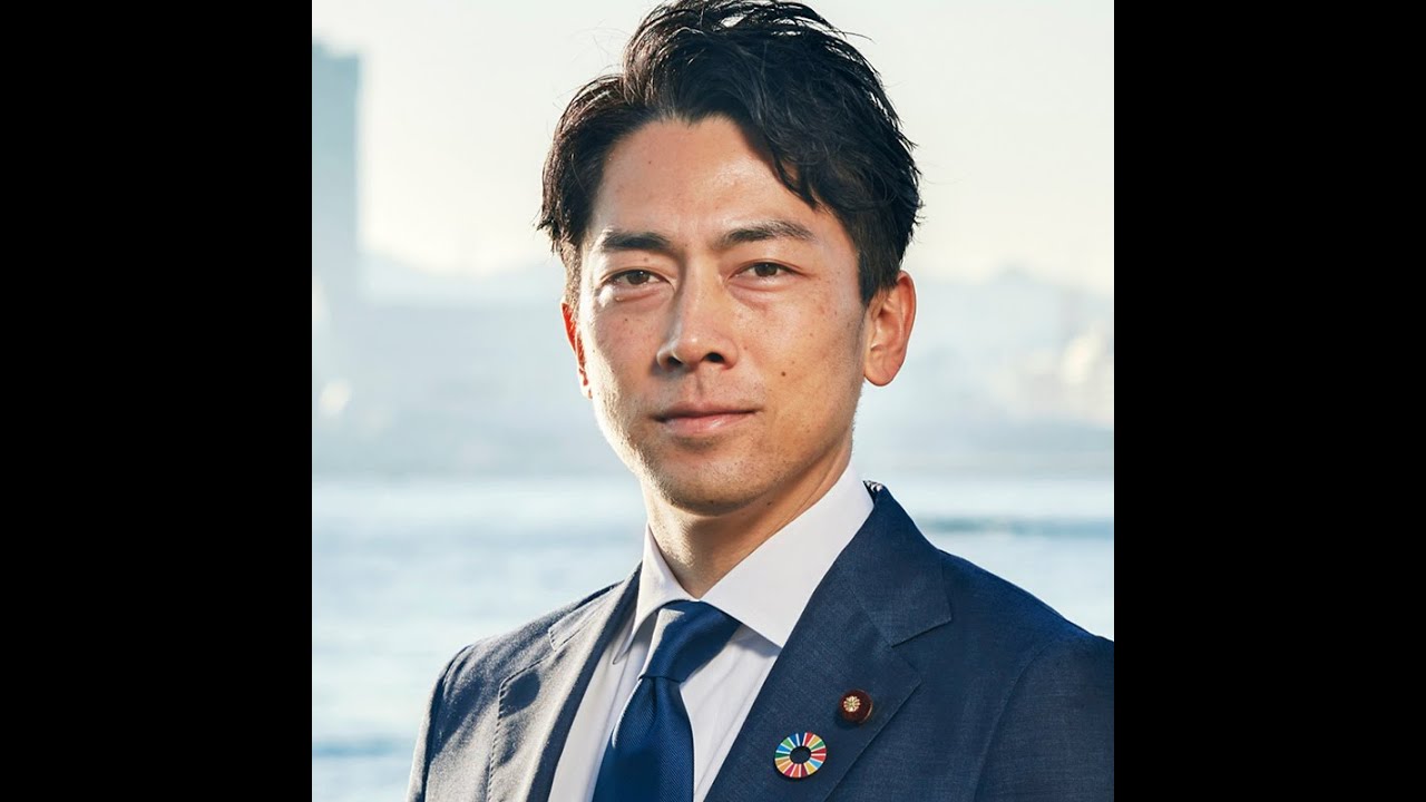 両手で抱くと手がふさがるね。