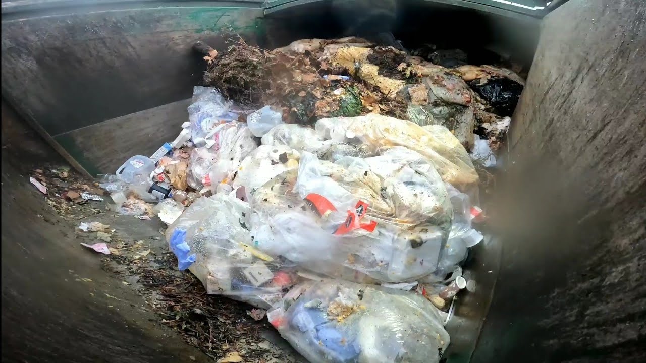Waste Management Autocar/Heil front  loader garbage truck p.o.v packing organic load 6