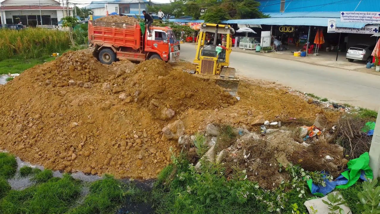 Just New Project!! 6-Wheel Dump Trucks & KOMATSU D31PX Dozer Filling Flooded Land Next to the Road.