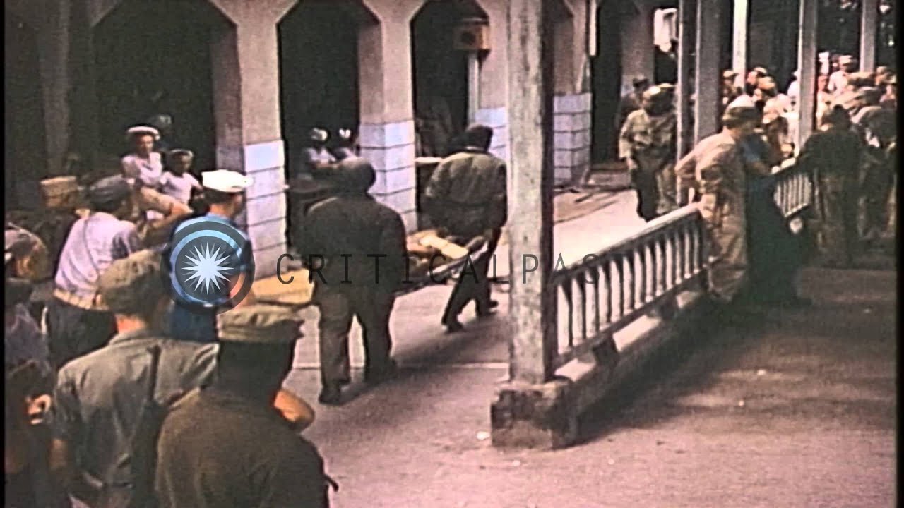 Freed Allied prisoners eat and drink at Nagasaki station in Japan after World War...HD Stock Footage