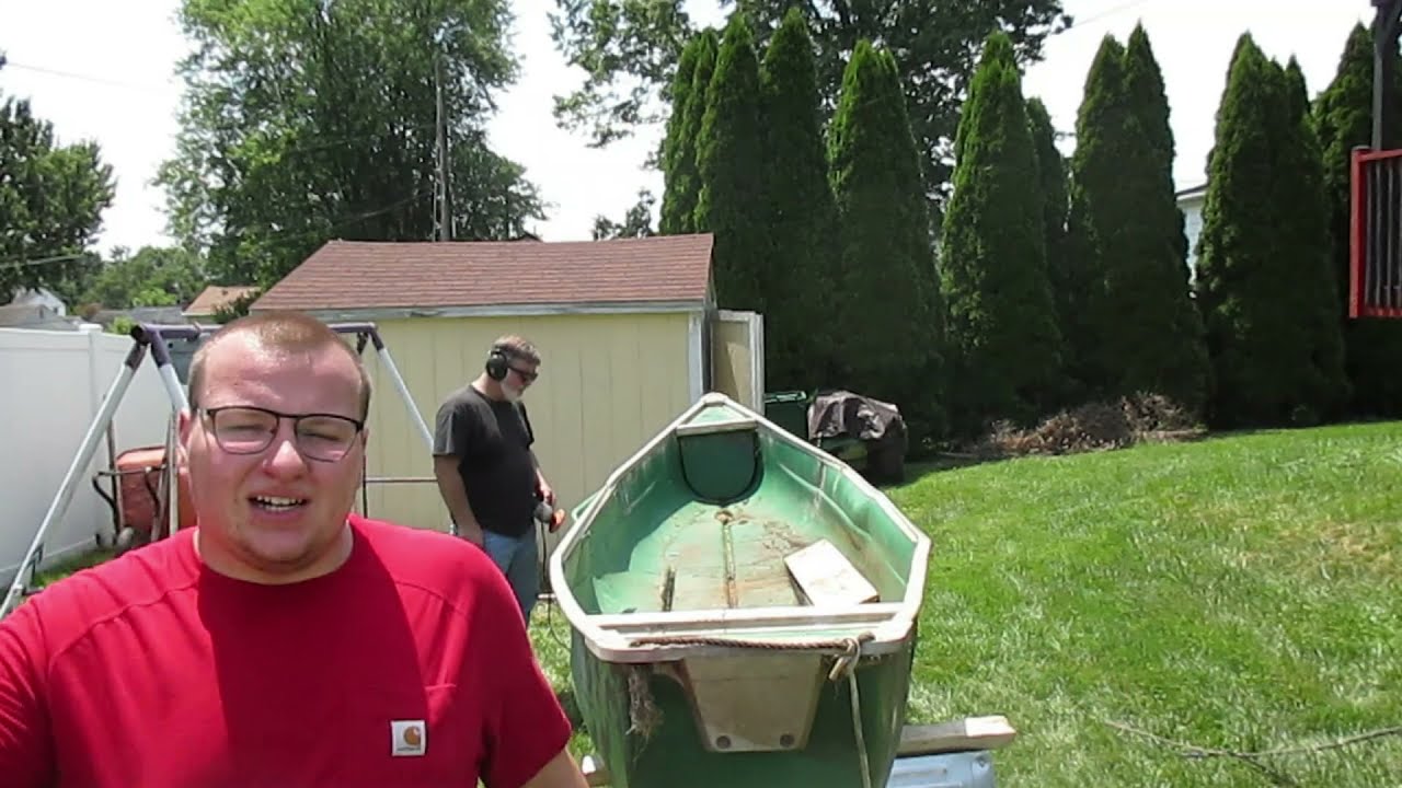 SEVERELY DAMAGED PLASTIC CANOE (AKA SCANOE)