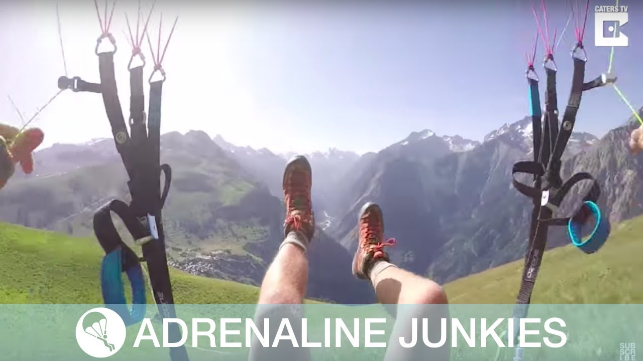 Paraglider Flies Close To Cliff Edge