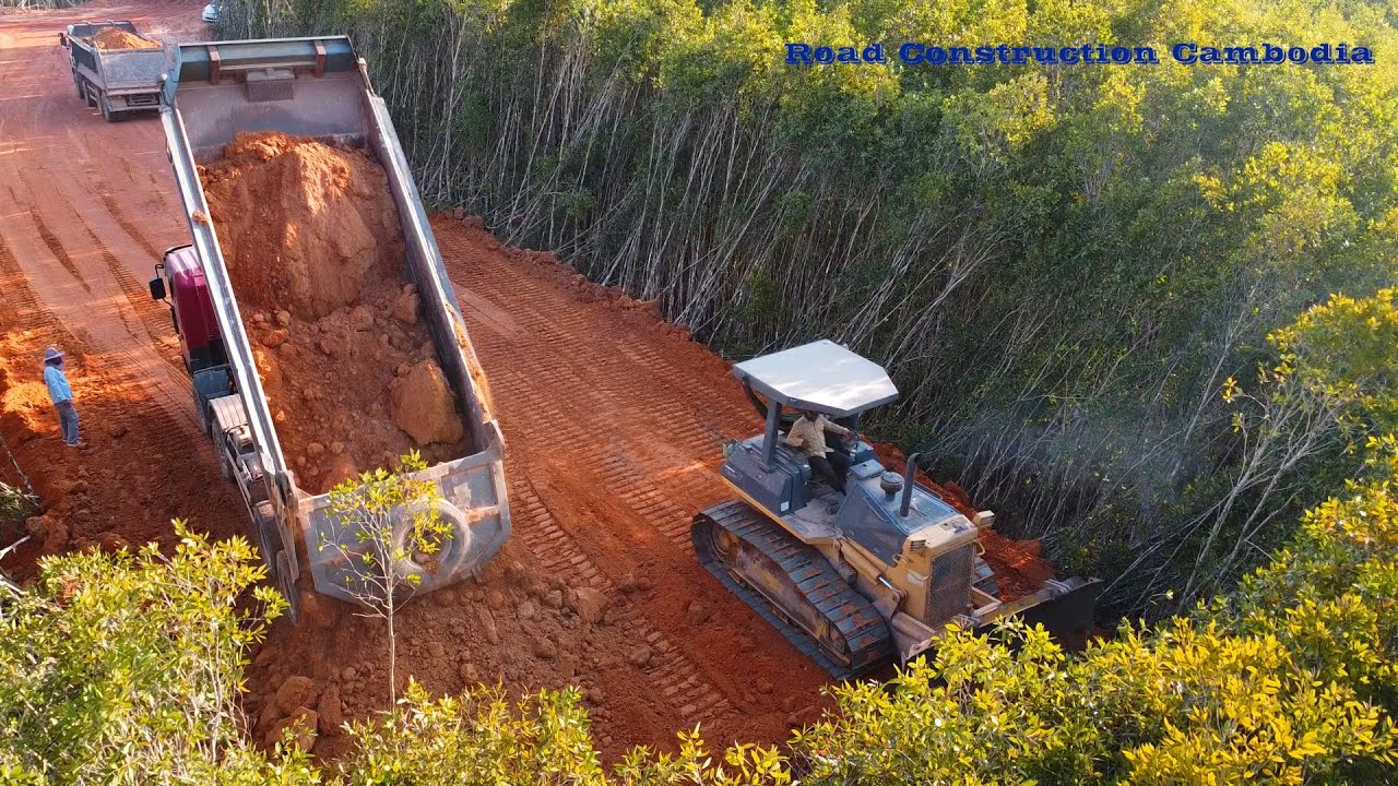 The First Video In My Channel Building New Road By Dozer And Dump Truck - គ្រឿងចក្រធ្វើផ្លូវកាត់ព្រៃ