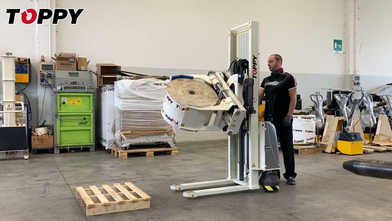 W&oacute;zek elektryczny - obracarka z chwytakiem do rolek 200kg Toppy WEB