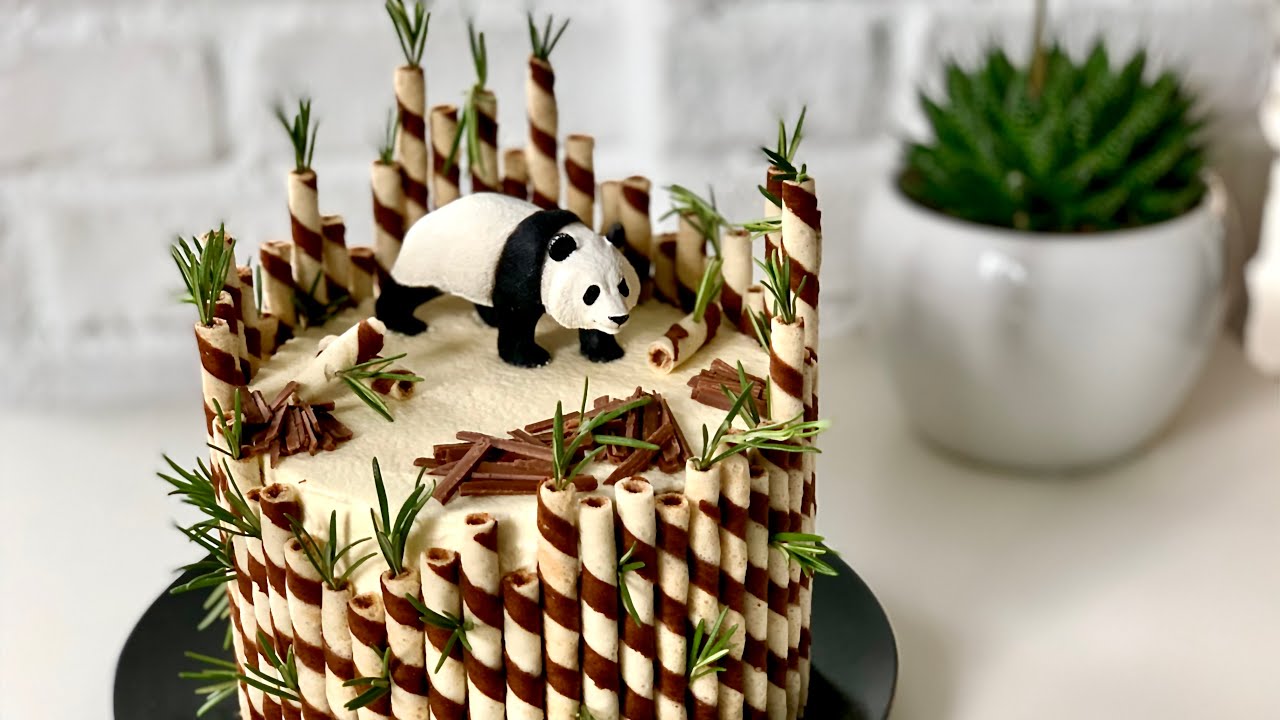 Panda cake | Chocolate cake with marshmallow cream and a touch of raspberries