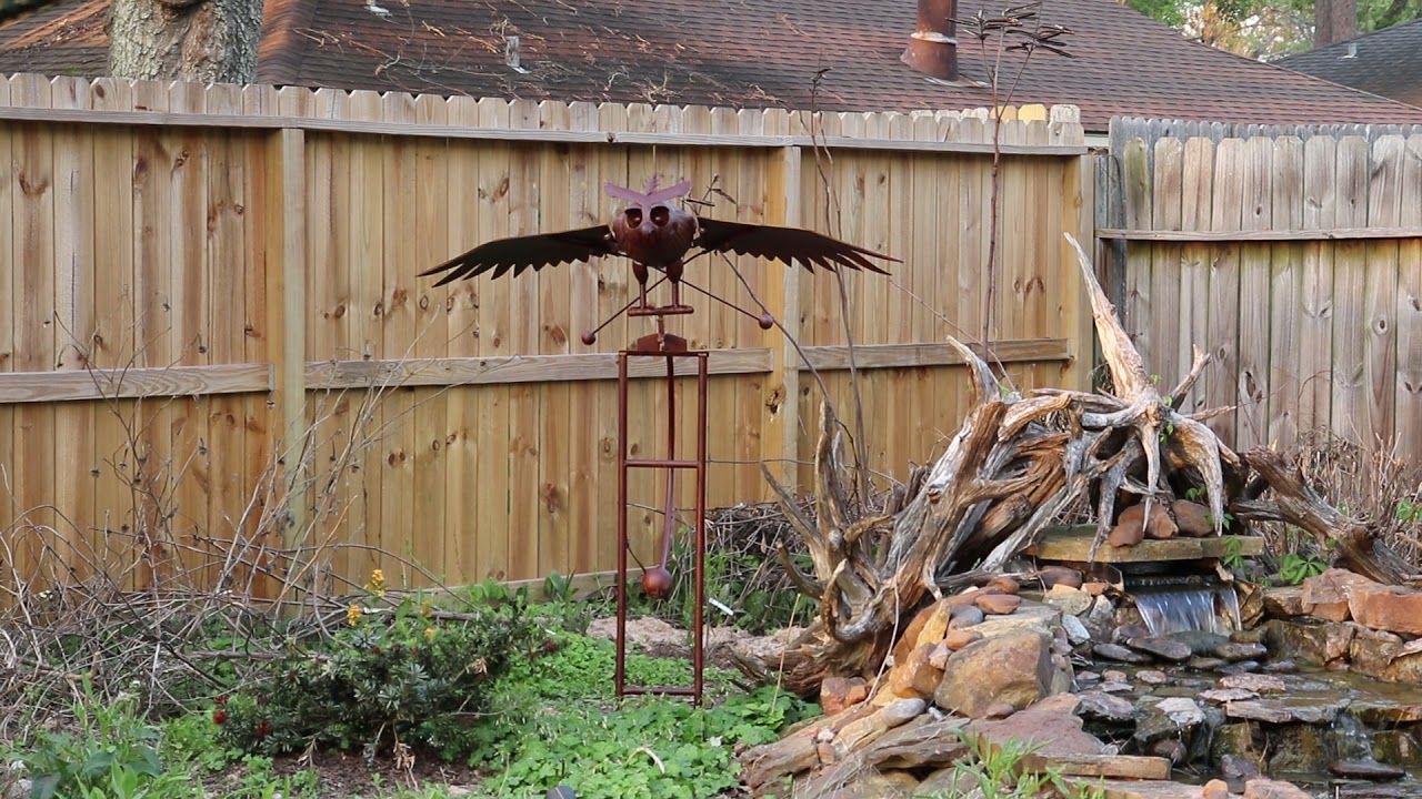 Kinetic owl sculpture