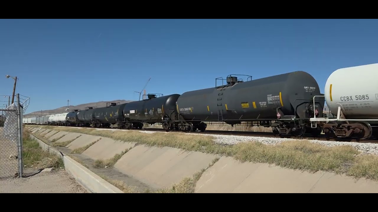 Union Pacific eastbound monster manifest train with a mid-train DPU in central El Paso TX 02/21/26