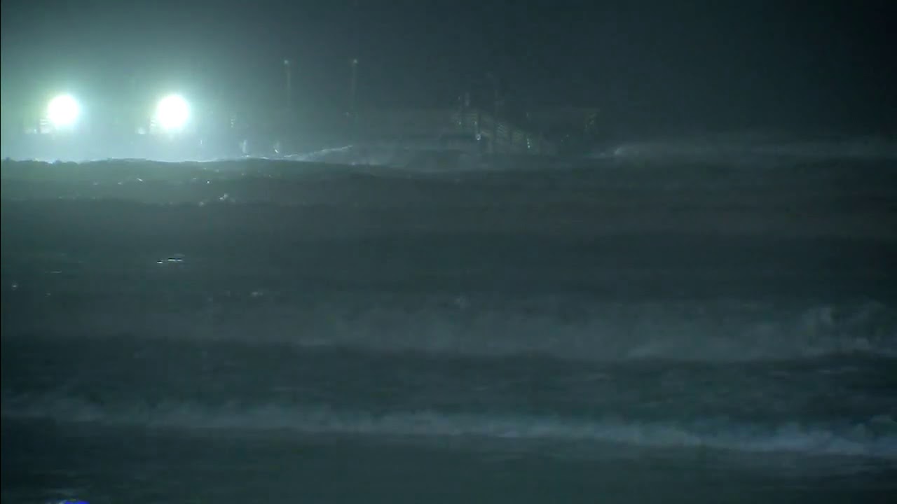 Rough waves pound 61st Street fishing pier in Galveston