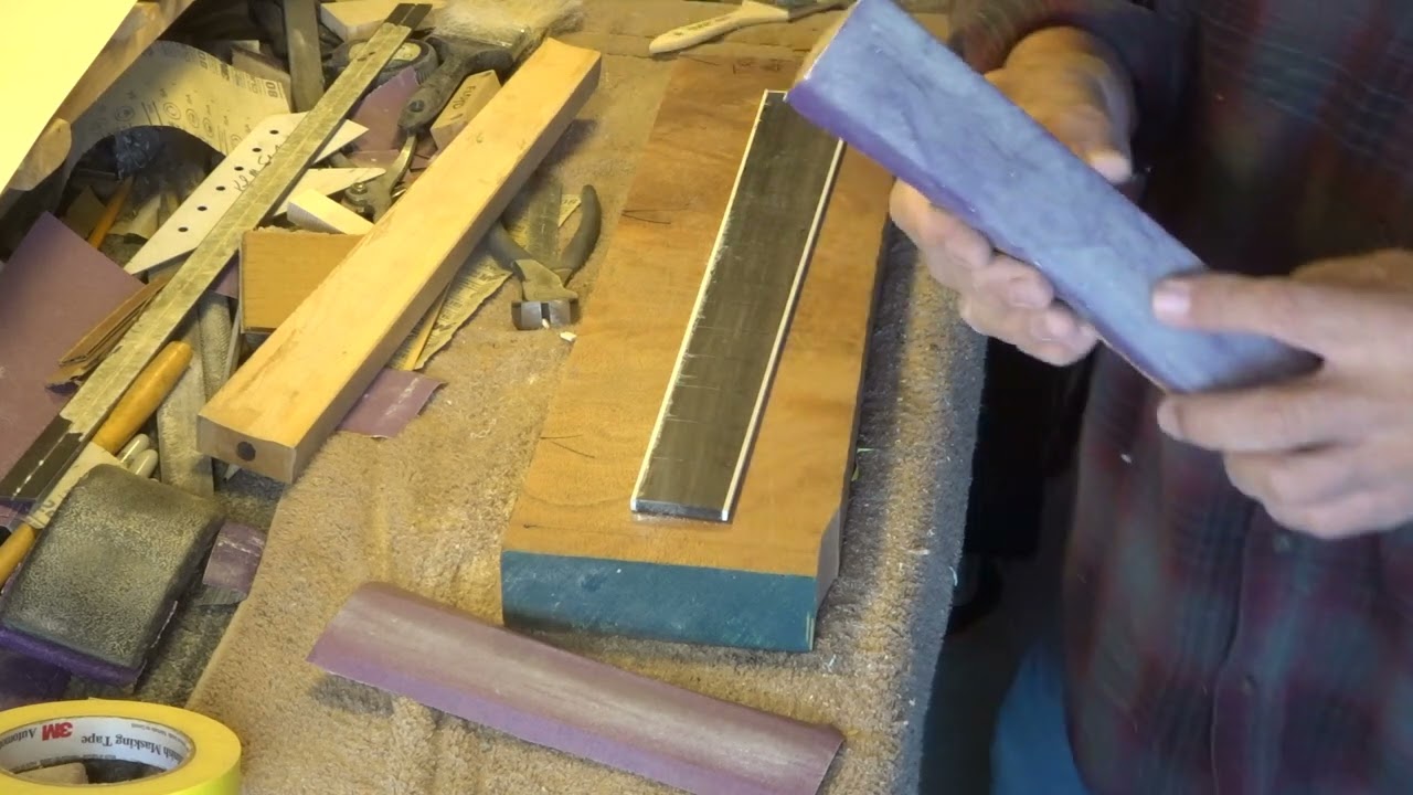 Karl Sandoval /  Preping fretboard after binding is glued on.
