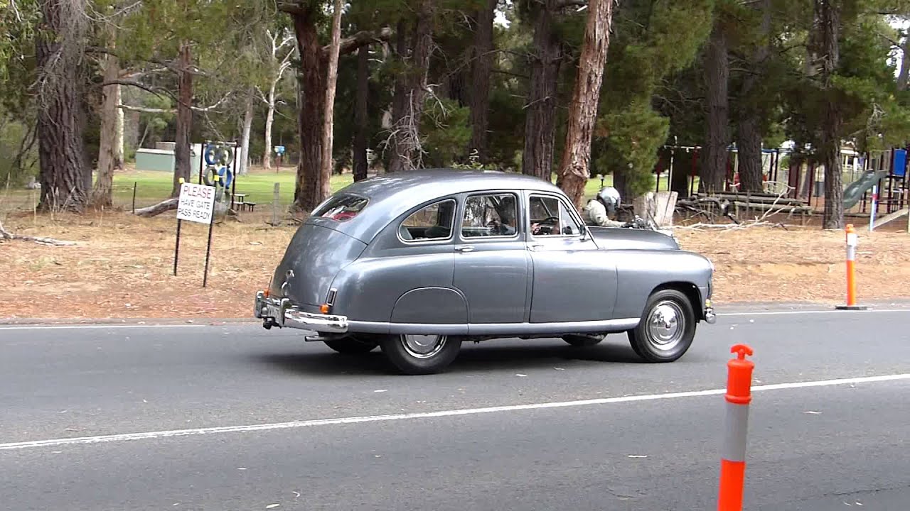Historic and Collectible British cars being driven. MG's Triumphs Jensen Lotus Jag Hillman and more.