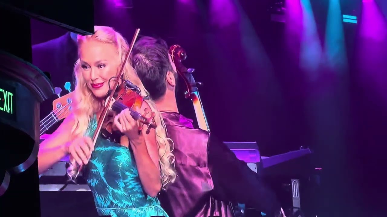 Quizas,, Quizas, Quizas. By Hauser cellist band. And Caroline Campbell the Violinist