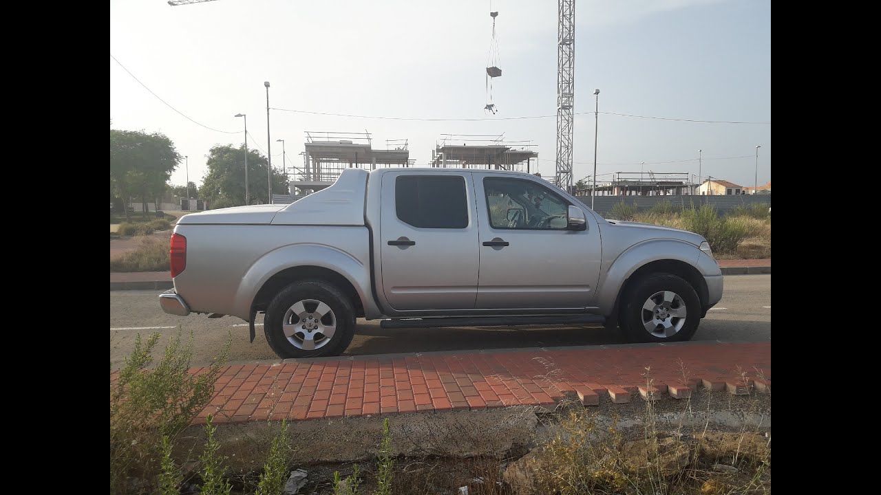 Cambiar correa de accesorios Nissan Navara 2007
