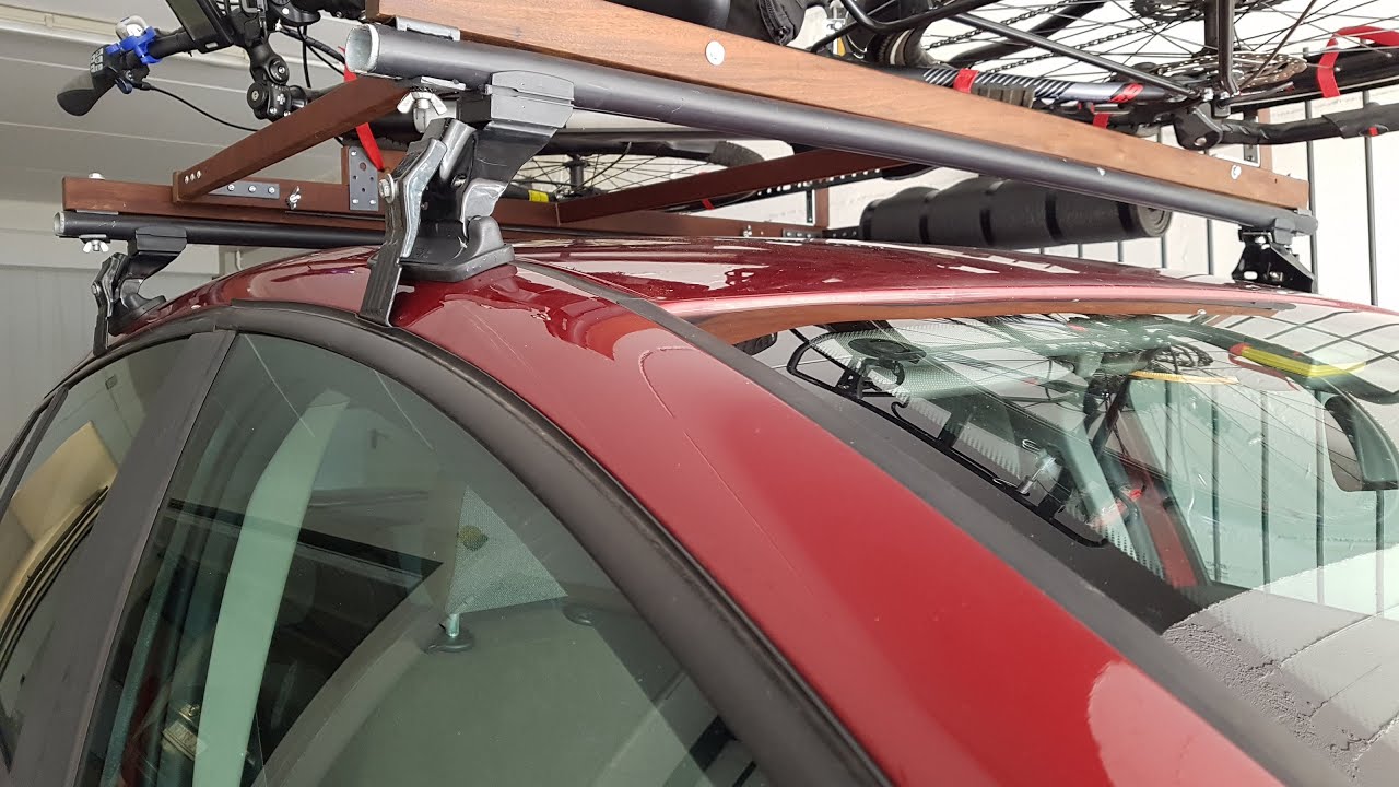 portabici scorrevole sul tetto dell'auto - sliding bike rack on the roof of the car