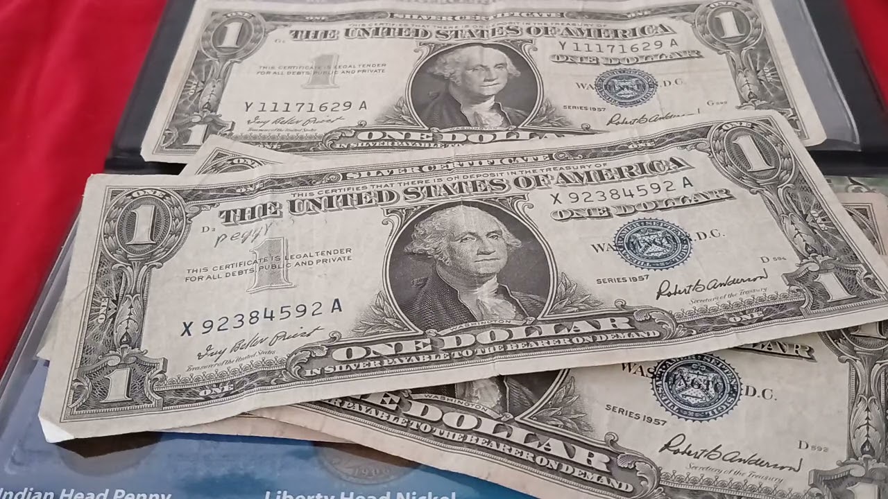 Precios de billetes de $1:00 d&oacute;lar de cello azul (1935 ,1957)