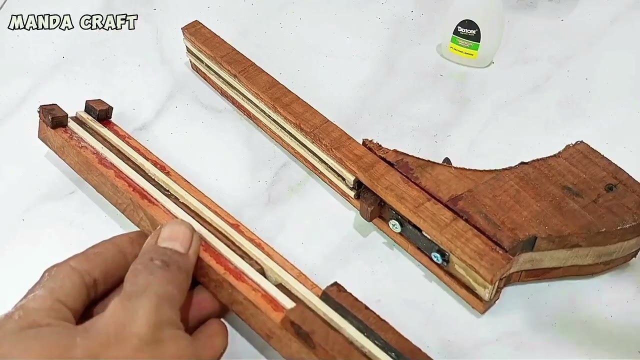 Wooden creation with diy slingshot #slingshot #woodscraft #diyslingshot