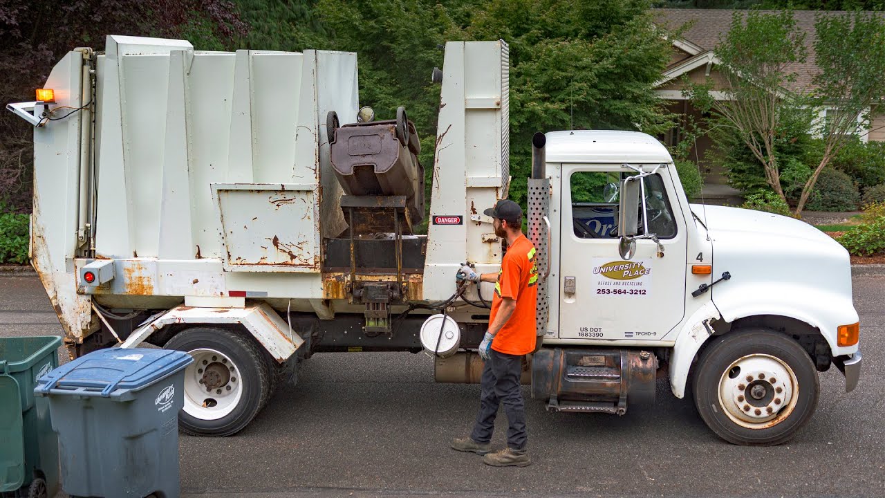 University Place Refuse & Recycling | Peerless Retriever Garbage Truck