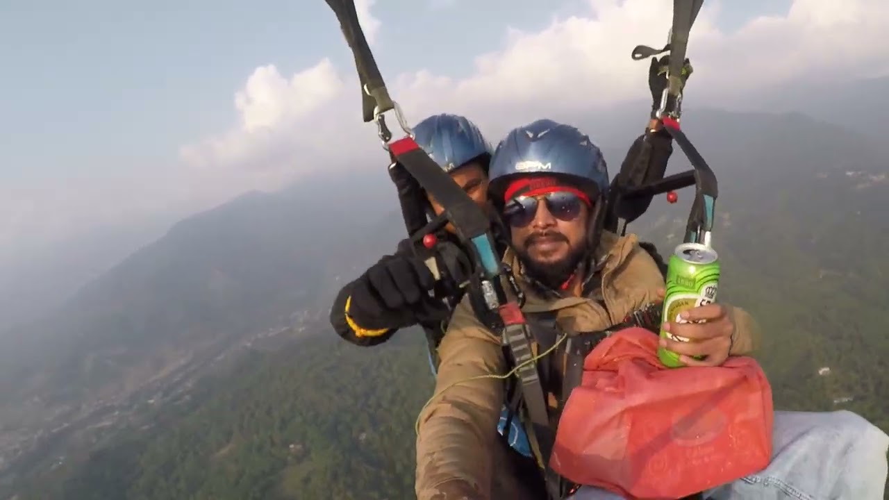 Brother cut the cake while paragliding on his birthday and also fed it to his pilot brother.