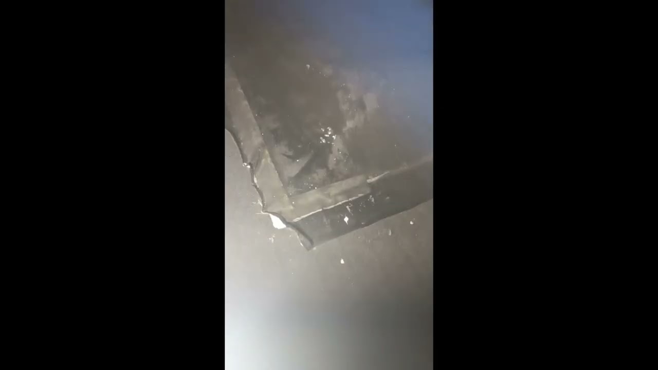 Redneck Roof Repair -- doublewide trailer after the storm