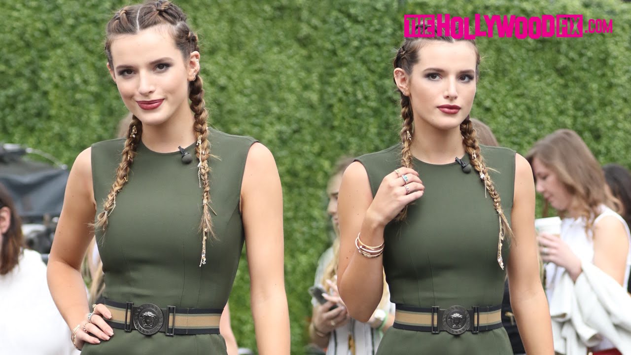 Bella Thorne Rocks Braids & A Green Mini-Dress At Extra Inside Universal Studios Hollywood 6.7.16