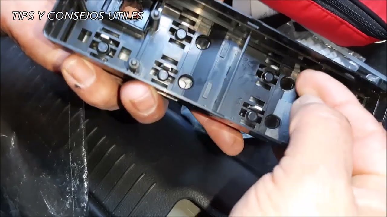 ARREGLO INTERRUPTOR ELEVA VIDRIO ELECTRICO  KIA CERATO 2009