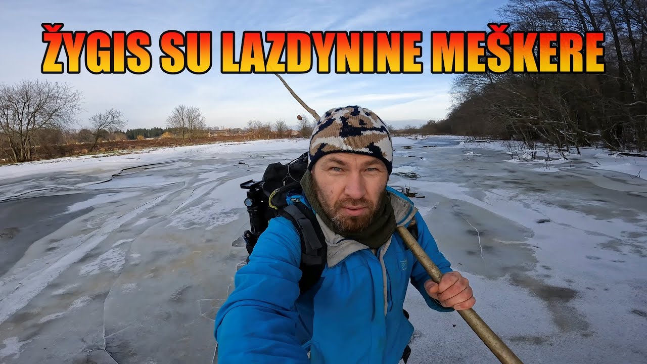 Žygis su lazdynine meškere žvejojant Danės upėj žiemą