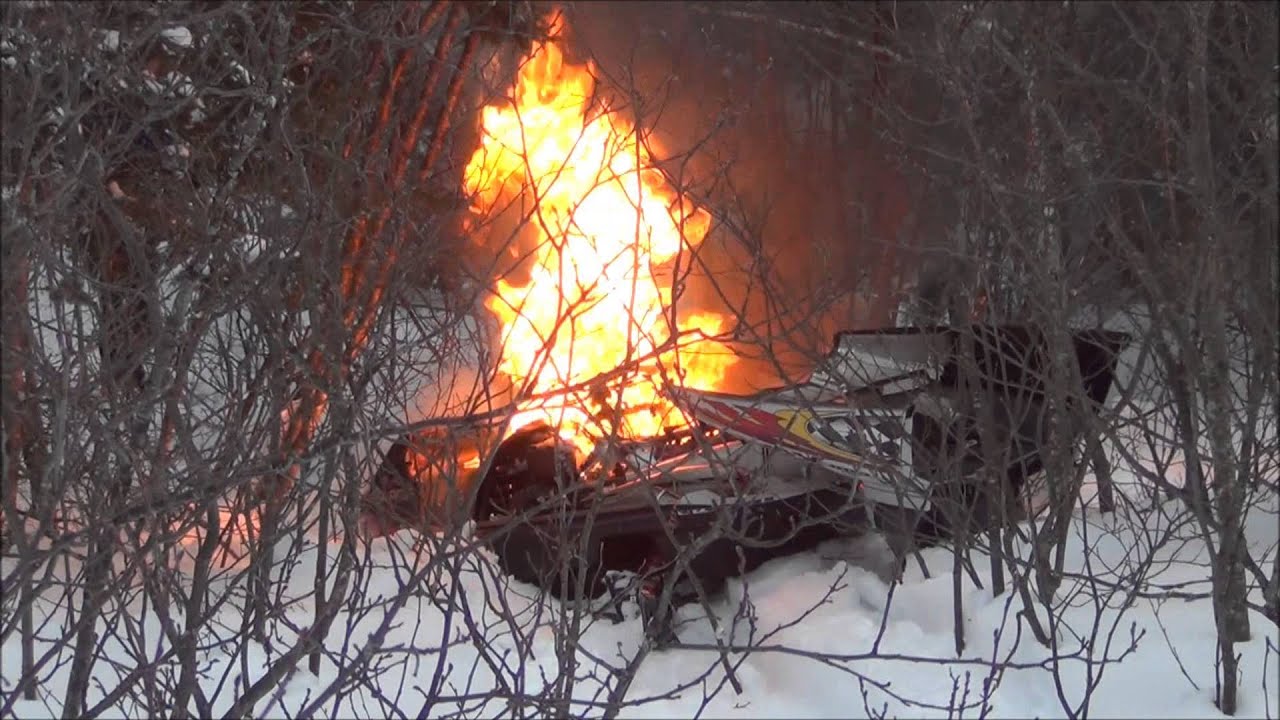 SNOWMOBILE STARTS ON FIRE!!