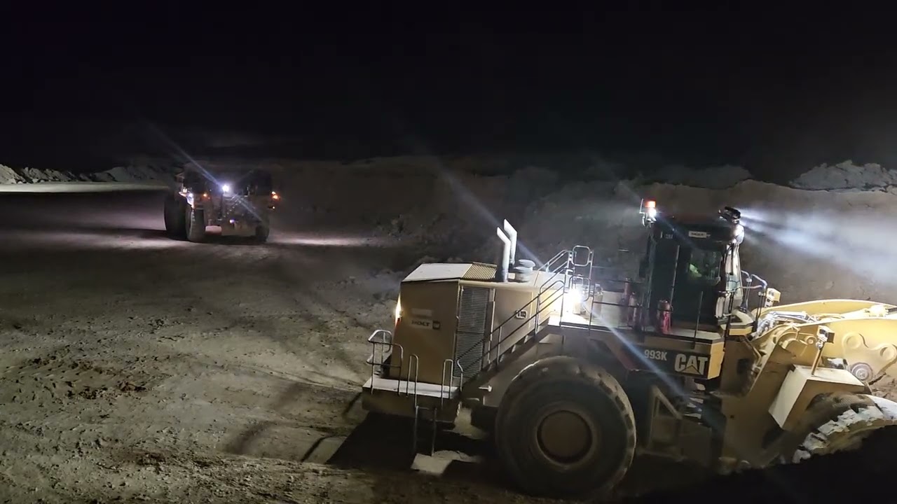 Cat 993 loading blasted Limestone onto Cat 785 haul truck.