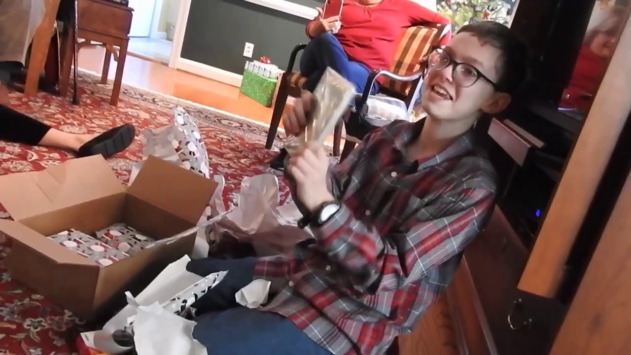 Child Cries Tears of Joy over Gaming Console for Christmas