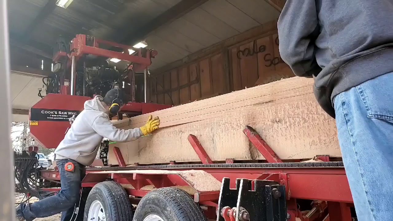 Cooks AC36 slabbing a 20-in. cant finishing with center cut 2x4s.