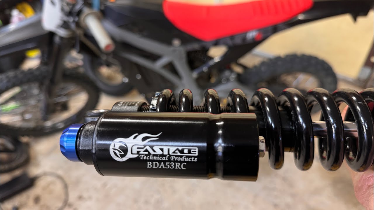 E-Moto Fastace shock oil and spring change out.  Stage 2 Razor