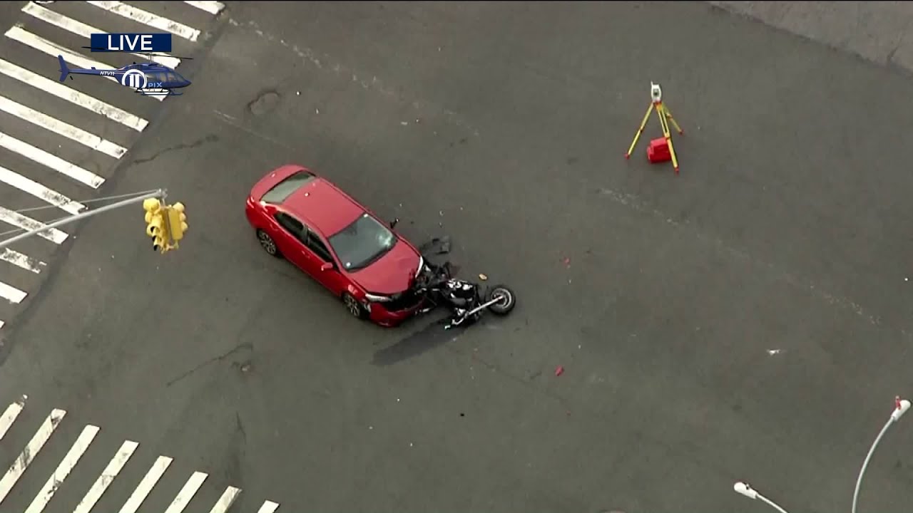 Motorcycle, car collide in the Bronx