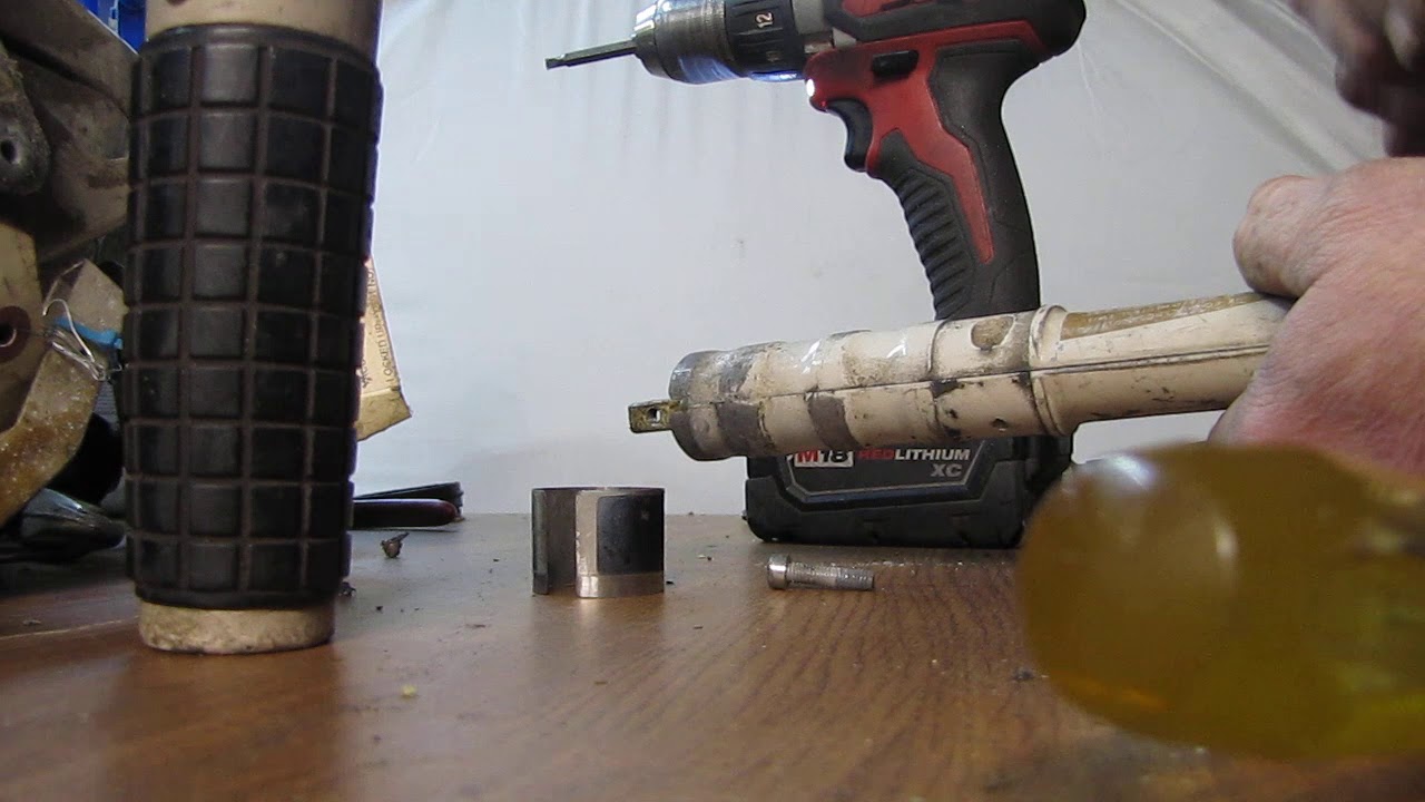 Assembly of a 1970's Johnson Evinrude outboard tiller handle