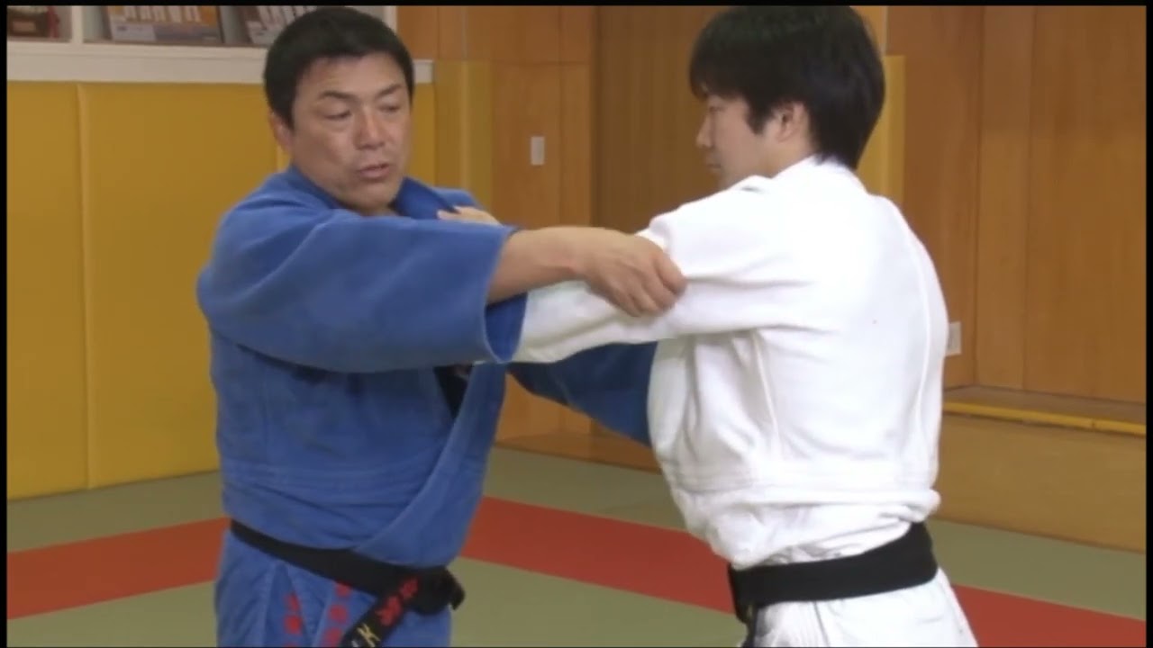 Tomoe nage by Toshihiko Koga. #judo