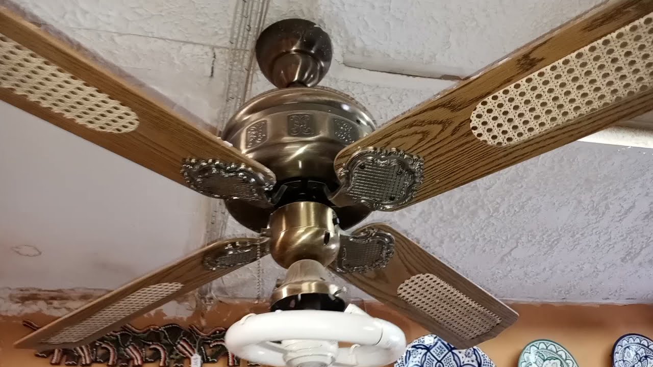 SMC E52 Top Mounts, Moss Marco Polo and Other Ceiling Fans in a Pottery Store
