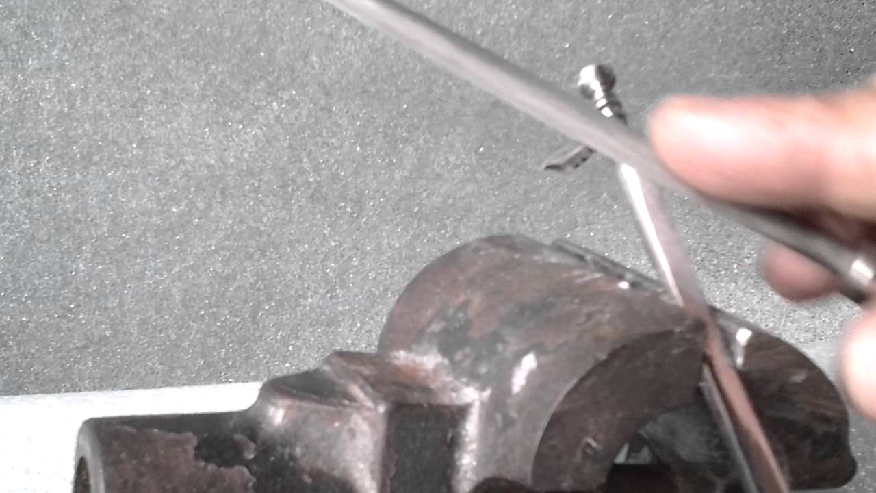 Espada feita com pregos