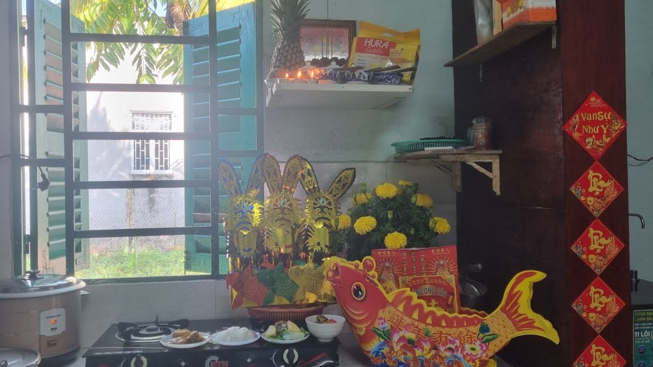 Đi chợ hoa , mua hoa về cúng đưa ông táo .