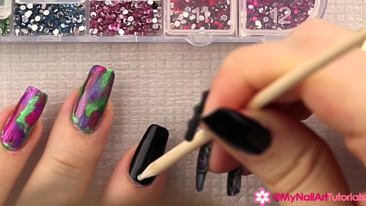 Nail Art Stamping Tutorial - black nails with colorful holographic peacock feathers